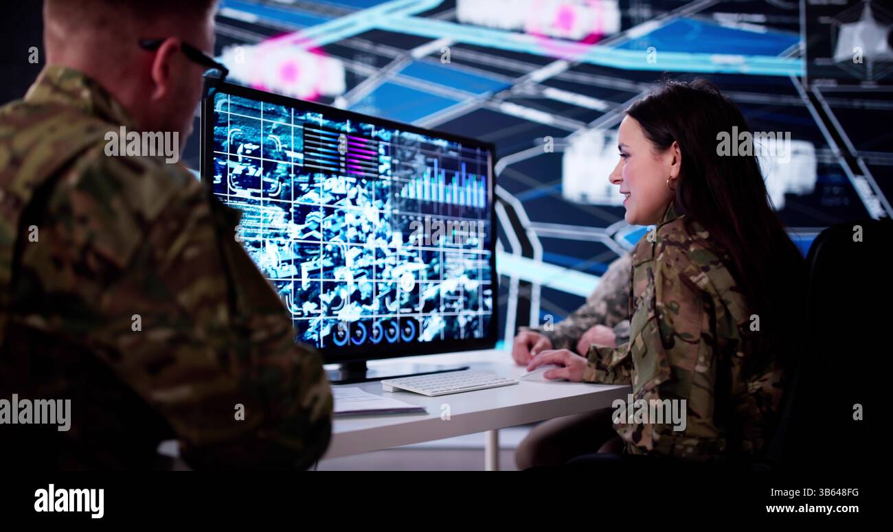Software Specialist Monitoring Online Surveillance For Military Cyber Security Operations Stock Photo