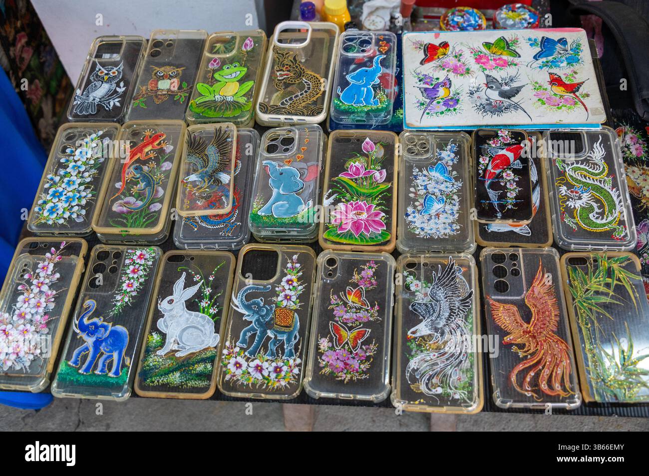 A display of designs on mobile phone cases at the Bo Sang Umbrella village in Chiang Mai, Thailand Stock Photo
