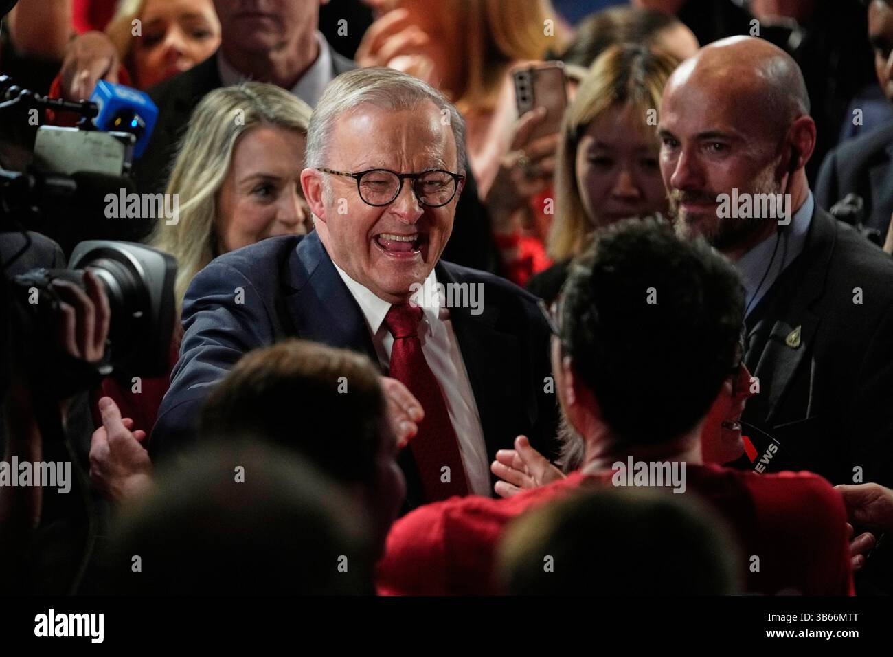Australian Prime Minister Anthony Albanese reacts as he meets party ...