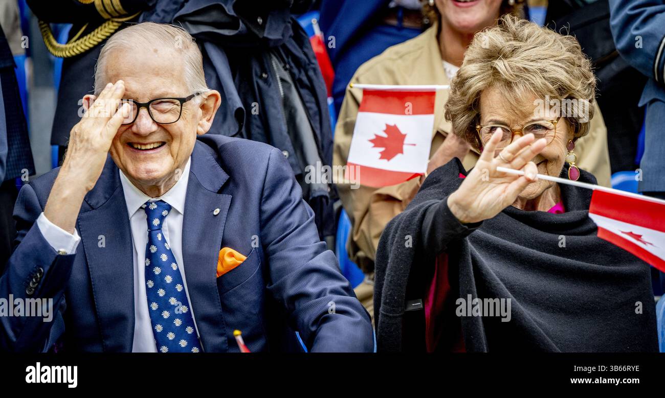 APELDOORN - Princess Margriet and Pieter van Vollenhoven during a street parade with the United Pipers for Peace in memory of war victims. During the street parade, (grand)children of Dutch veterans walked along with relatives of Canadian veterans. ANP ROBIN UTRECHT netherlands out - belgium out Stock Photo