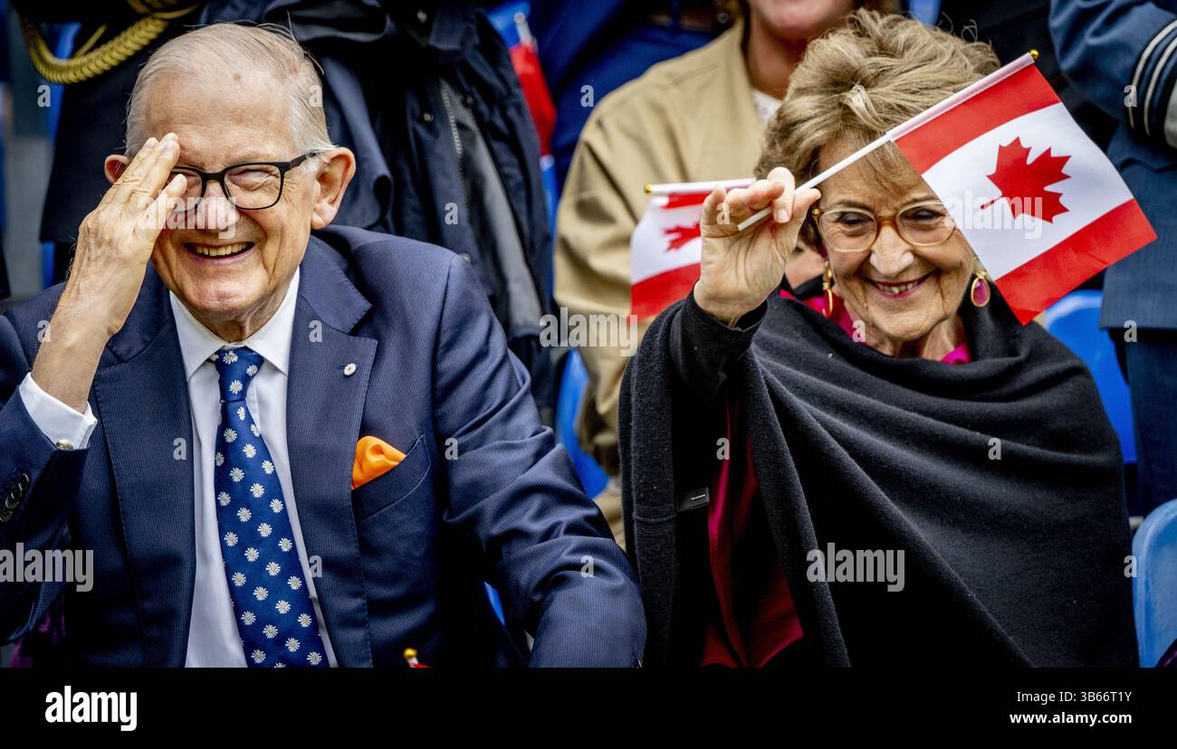 APELDOORN - Princess Margriet and Pieter van Vollenhoven during a street parade with the United Pipers for Peace in memory of war victims. During the street parade, (grand)children of Dutch veterans walked along with relatives of Canadian veterans. ANP ROBIN UTRECHT netherlands out - belgium out Stock Photo