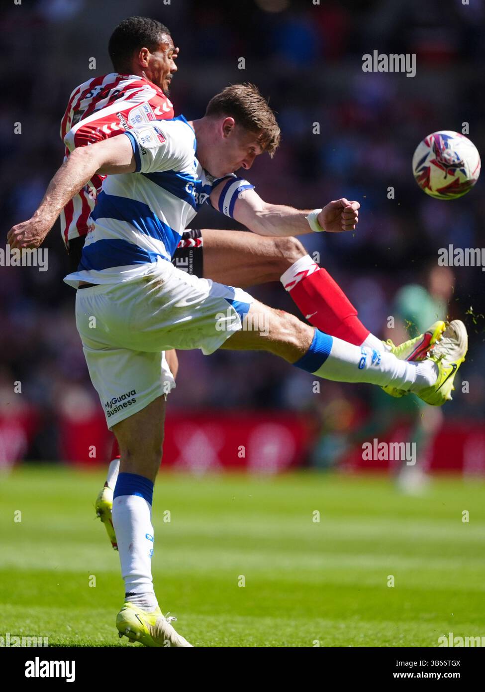 Sunderland's Wilson Isidor (left) and Queens Park Rangers' Jimmy Dunne ...