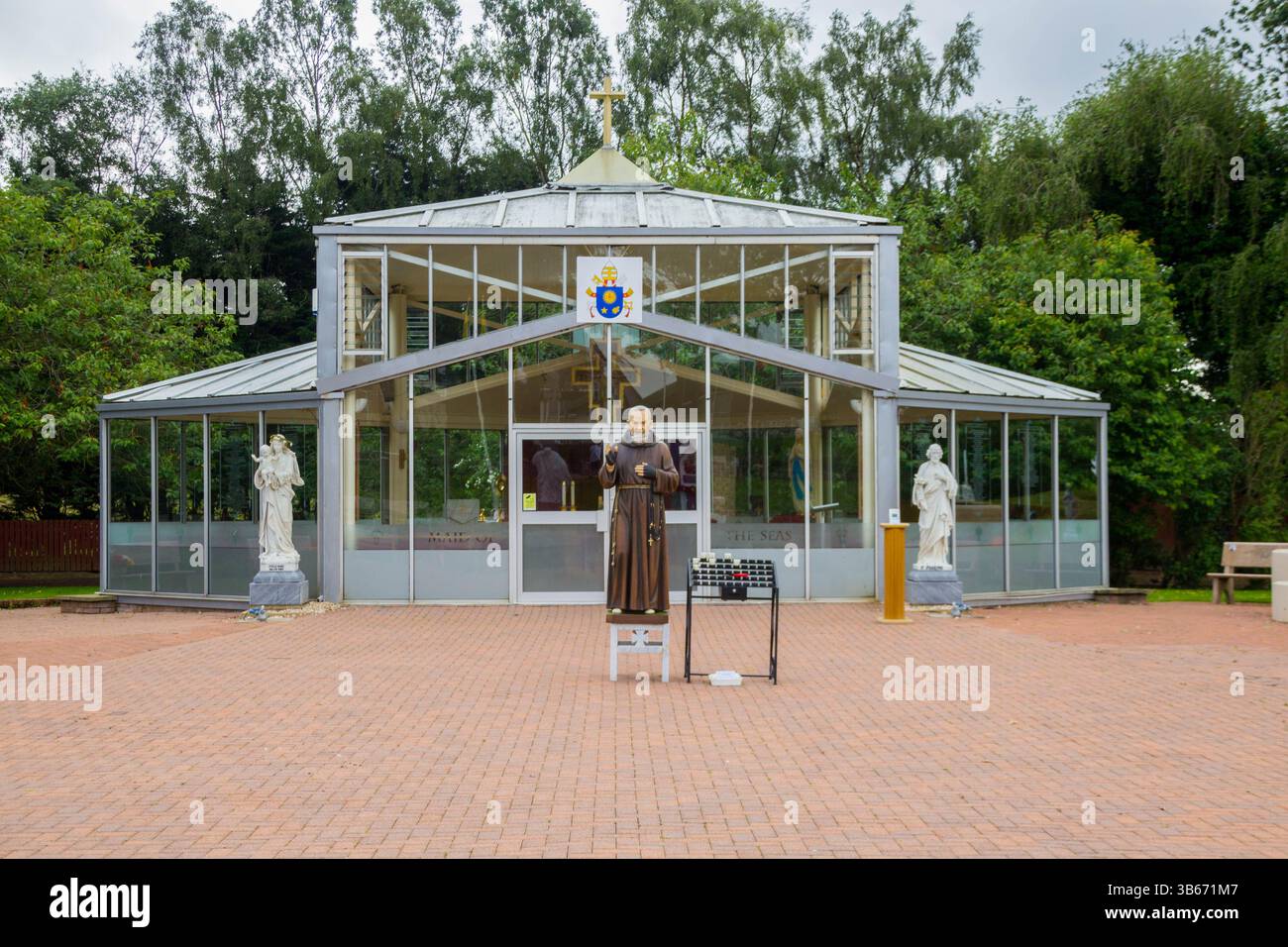 Glass Chapel in Grotto Park. The National Shrine of Our Lady of Lourdes Located in Carfin, Motherwell, Scotland Stock Photo