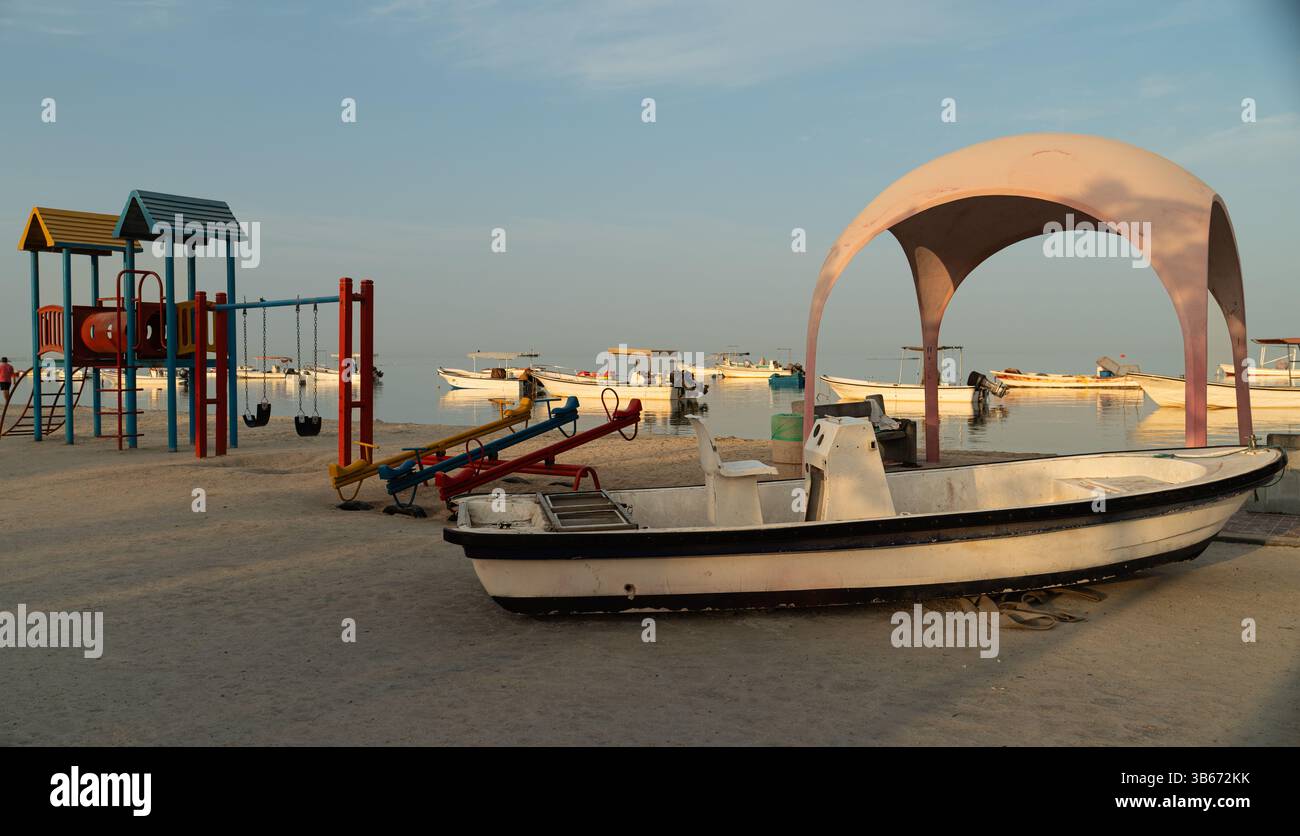 Boat rides and recreational facilities offer kids fun time along Malkiya  Beach in Hamad Town, Northern Governorate, Kingdom of Bahrain Stock Photo -  Alamy