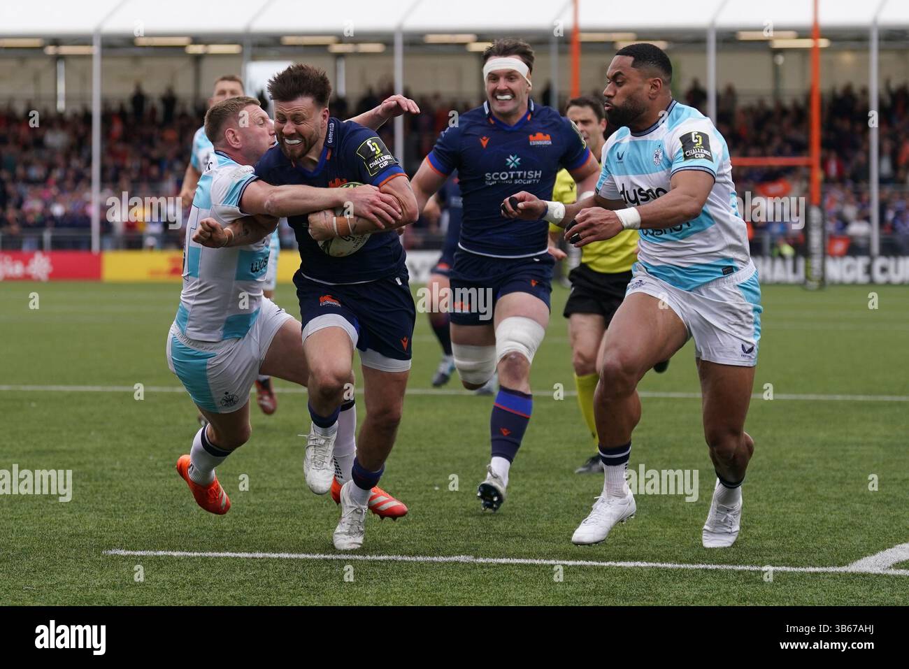 Edinburgh Rugby’s Ali Price (bottom, centre) scoring a try during the ...