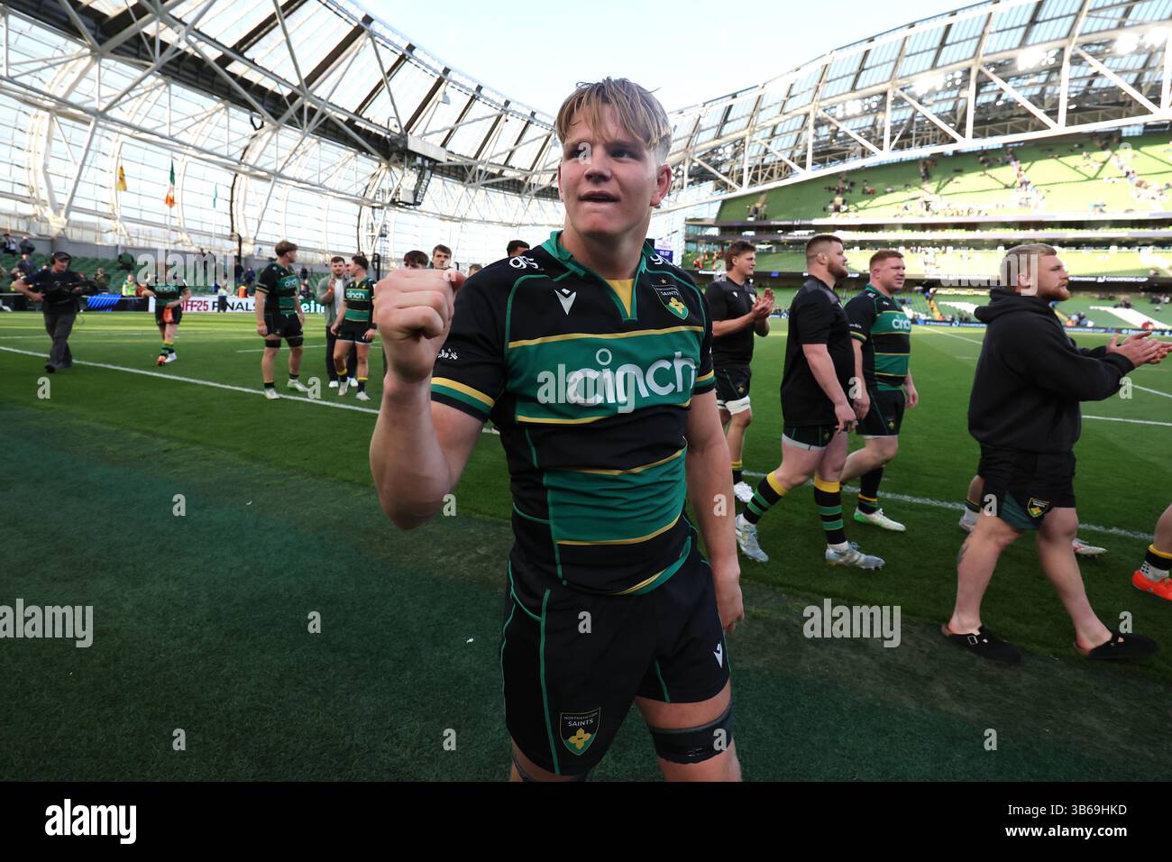 Northampton Saints' Henry Pollock (centre) and team-mates celebrate ...