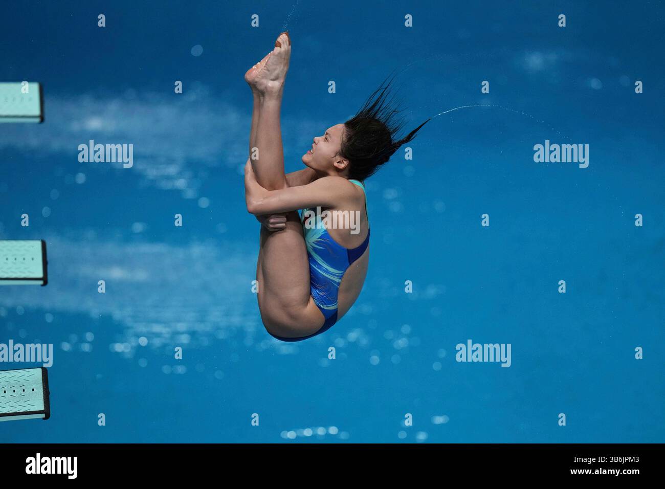 Chen Jia of China competes in the Women's 3m Springboard event for the ...