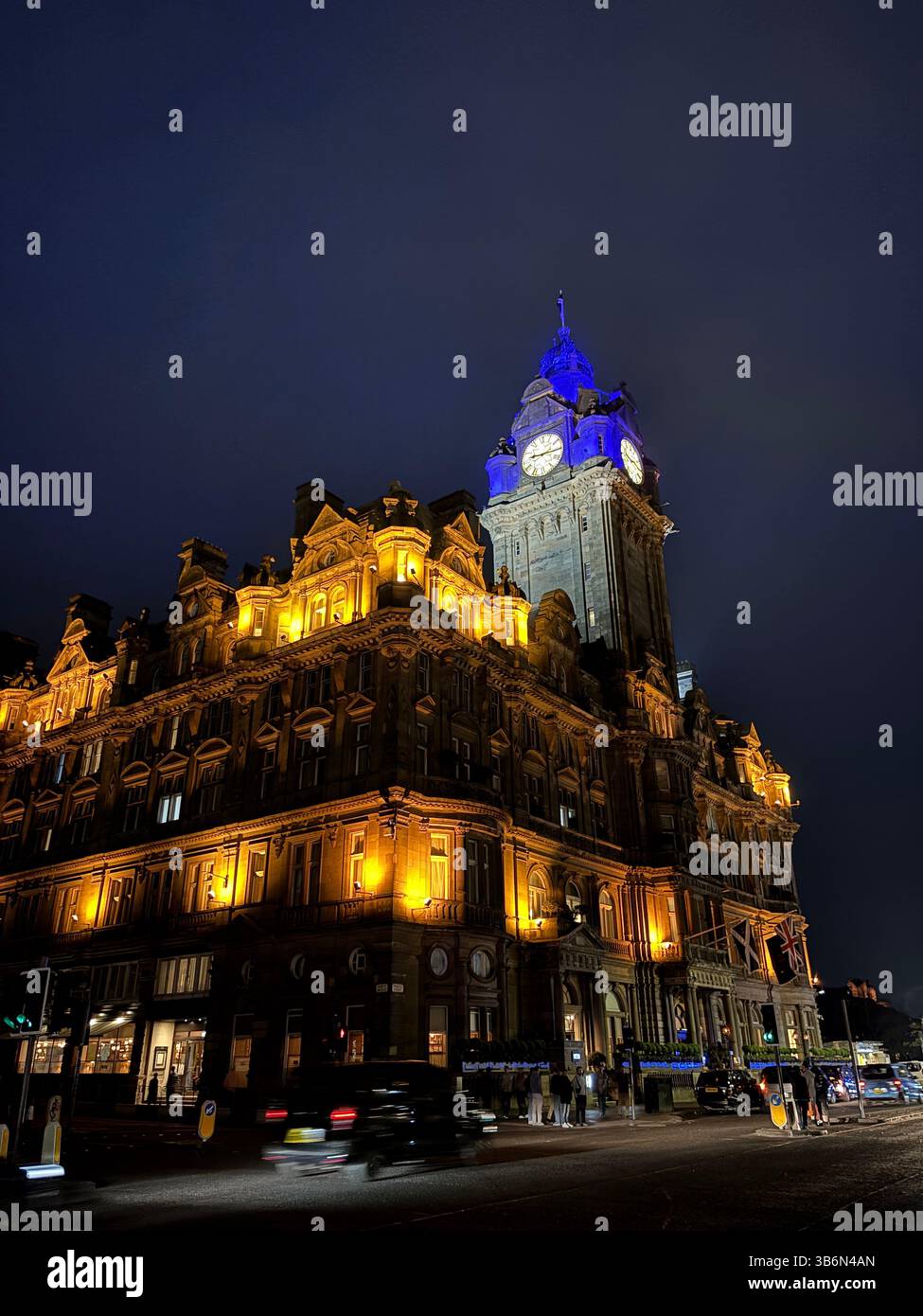 The Balmoral hotel and clock tower at night. Edinburgh iconic famous ...