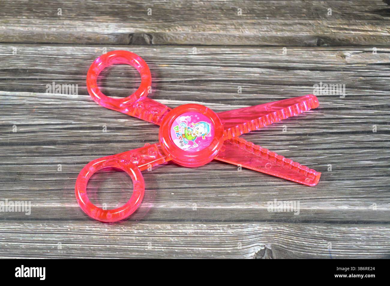 Cairo, Egypt, March 15 2025: Lace scissors without blades for kids and ...