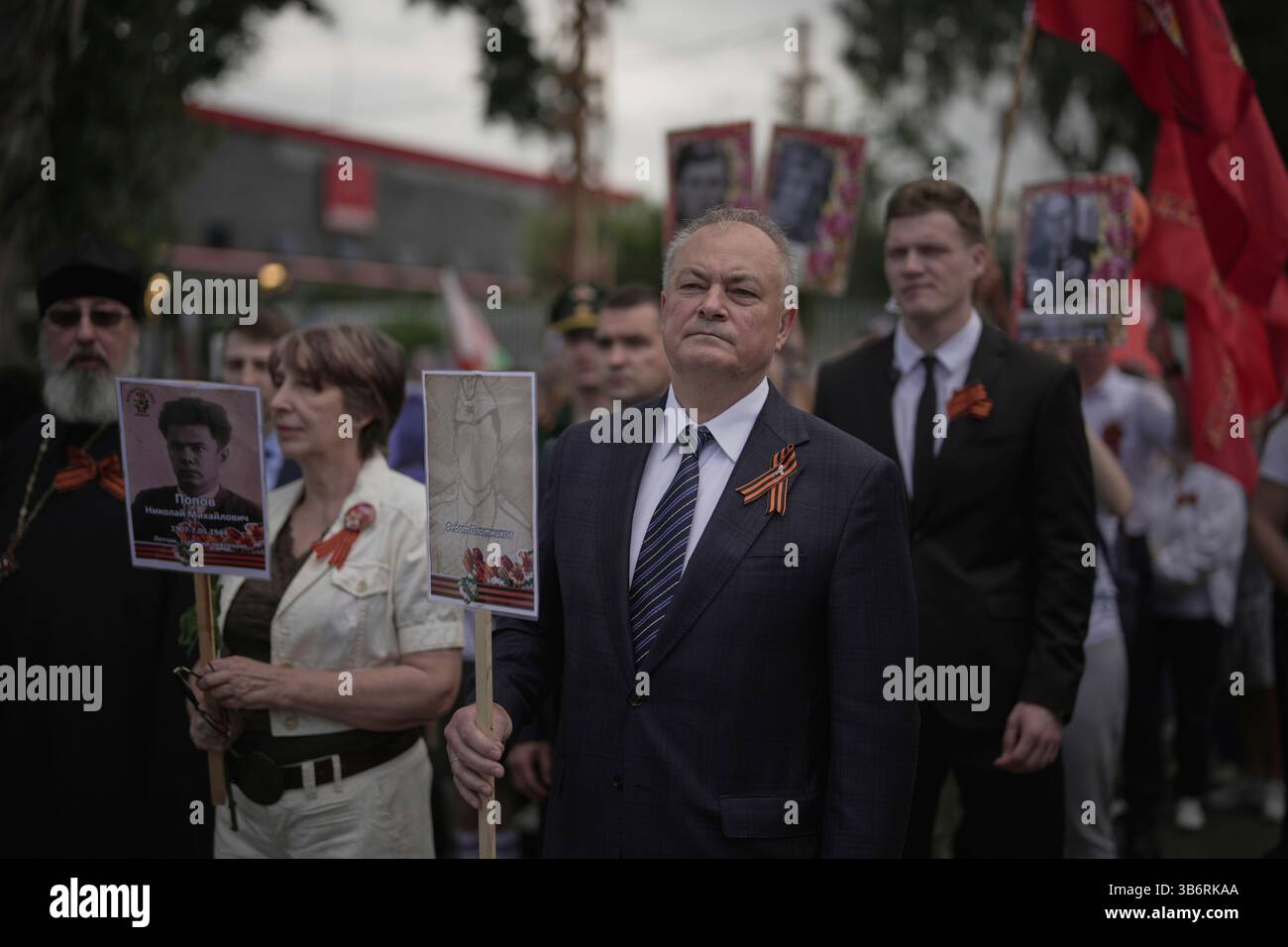 Russian Ambassador to Lebanon Alexander Rudakov, center, joins Lebanese ...