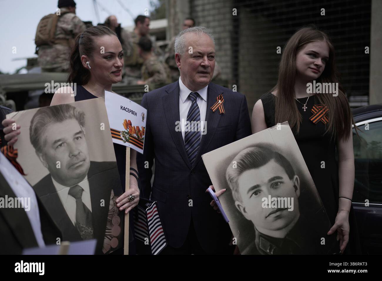Russian Ambassador to Lebanon Alexander Rudakov, center, joins Lebanese ...
