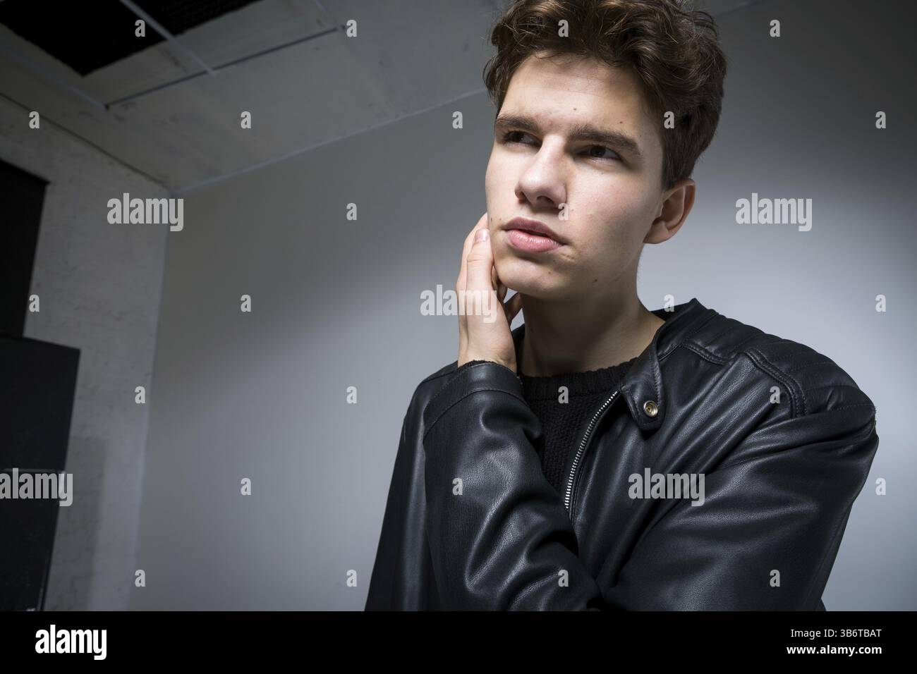 Young black male model posing hi-res stock photography and images - Alamy