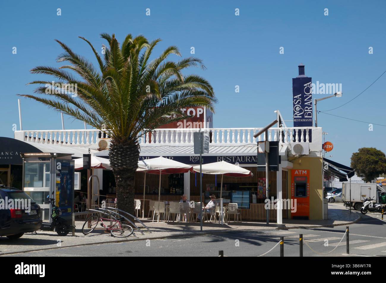 people at a cafe, Quarteira,,Algarve,Portugal,Europe Stock Photo