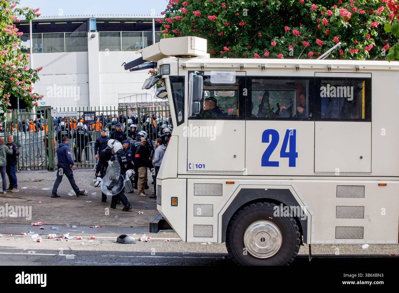 Brussels, Belgium. 04th May, 2025. Riot police and soccer fans pictured ...