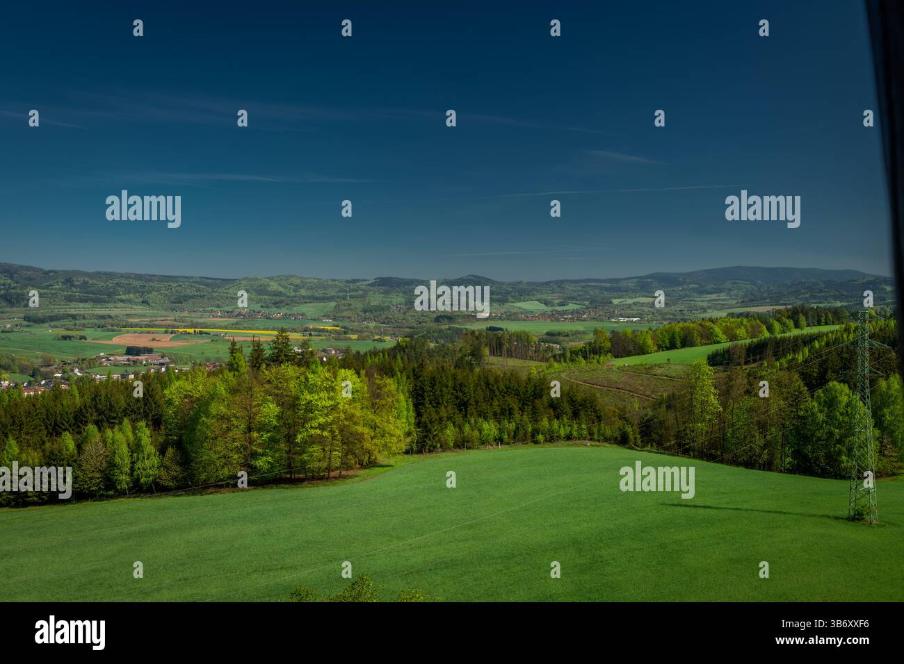 View from wooden lookout tower Signal for spring nature near Horni Radechova village CZ 04 27 2025 Stock Photo