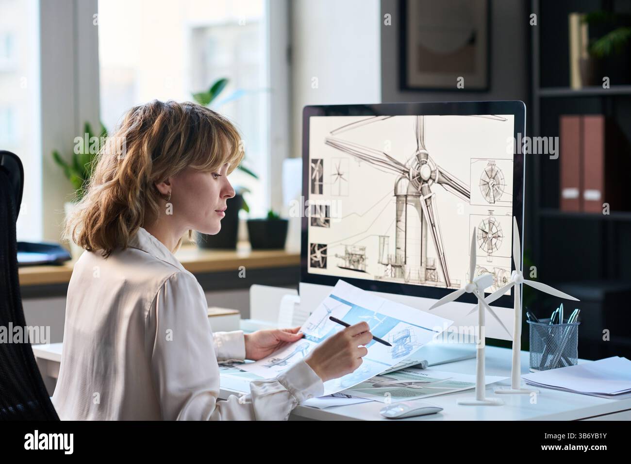 Female Industrial Engineer Working on New Project Stock Photo