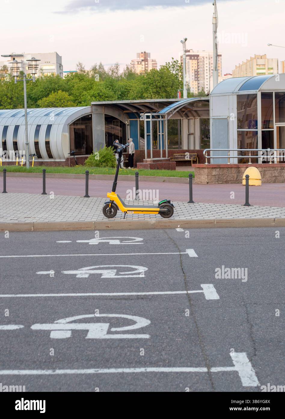 Shot of the rental electric scooter on the street of the city Stock Photo