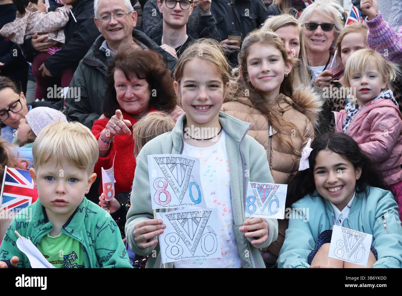 London, UK 4th May 2025. Locals gathered at Stephen's House & gardens in Barnet, north London, to commemorate VE day's 80th anniversary. Highlights included maypole dancing, a 1940s trio, actor Daniel Mays reading from local Spike Milligan's diaries, recreating a photo taken for VE day in 1945, and a visit from veteran Lawrie Porter. Credit : Monica Wells/Alamy Live News Stock Photo