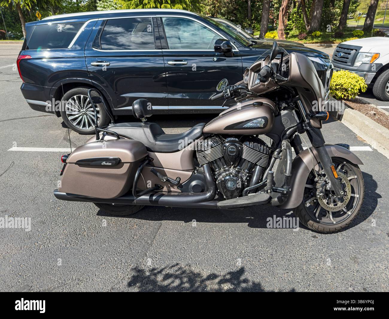 Late-model Indian Chieftain Motorcycle from right-hand side in a parking lot. - Smartphone Captured Stock Image