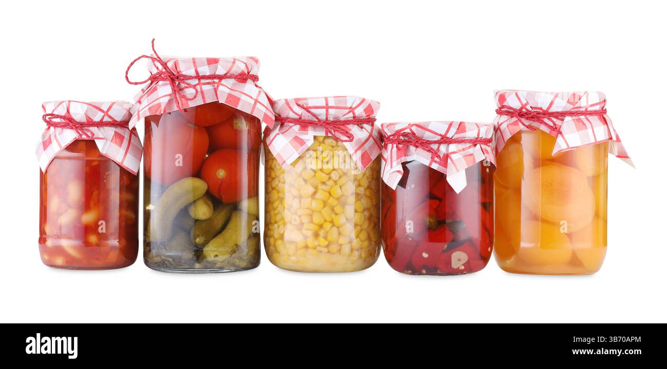 Many jars with different pickled products isolated on white Stock Photo