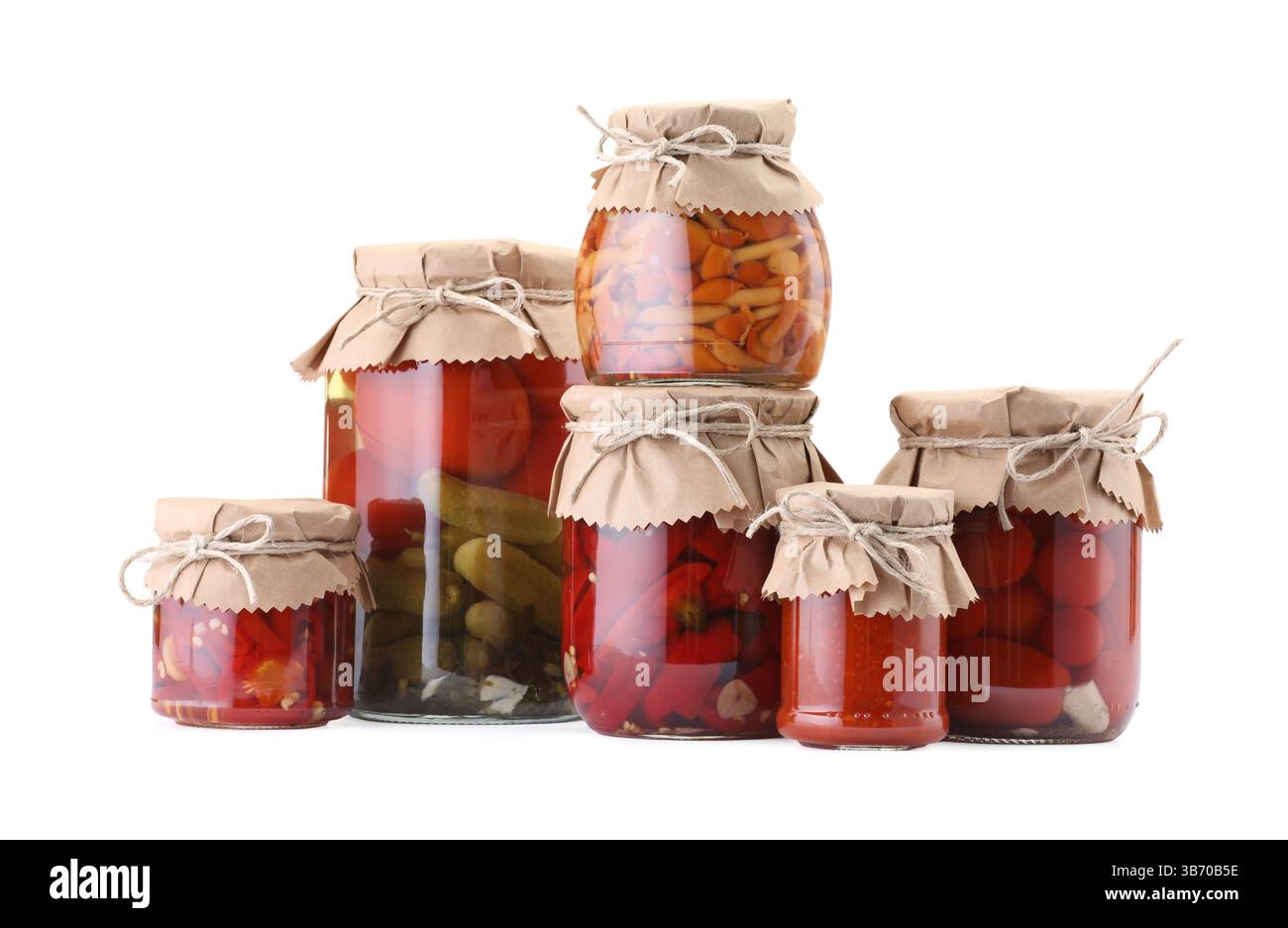 Many jars with different pickled products isolated on white Stock Photo