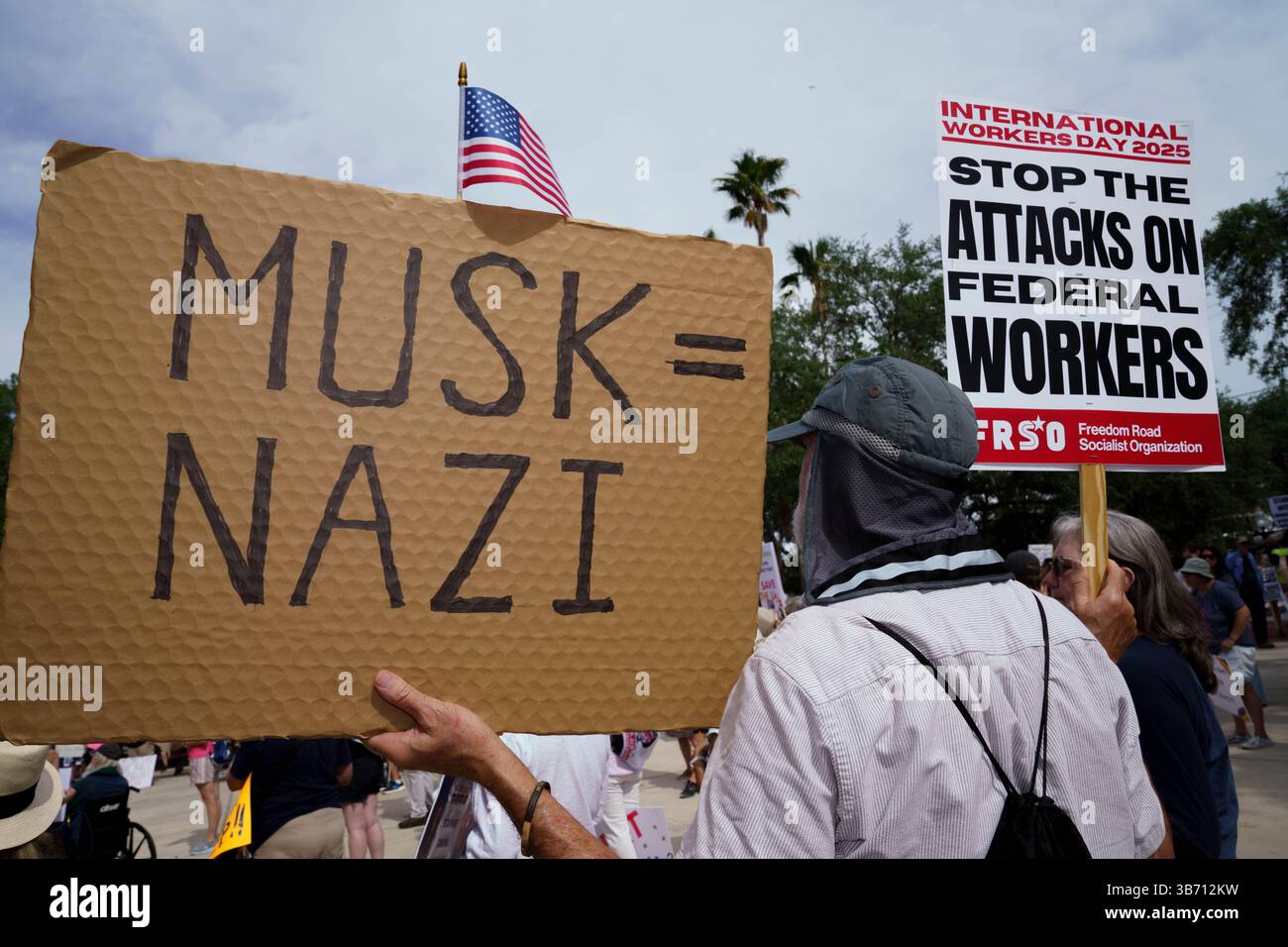 St Petersburg, Florida, USA. 3rd May, 2025. A May Day Protester Holds A ...