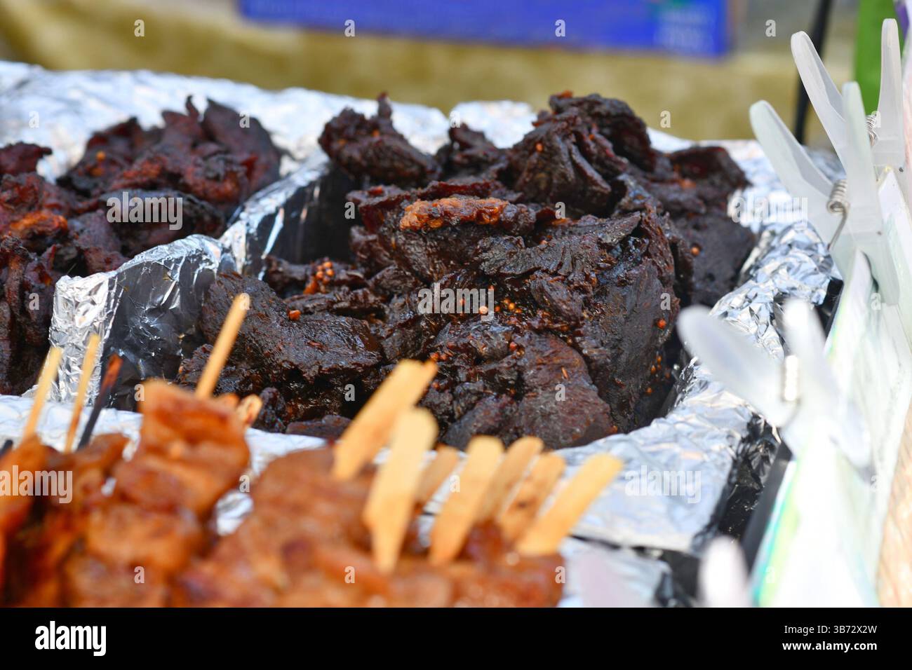 Stir-fried thai beef with black soy sauce in street food market called 'Neua Dad Deow', Thai sun dried beef jerky Stock Photo