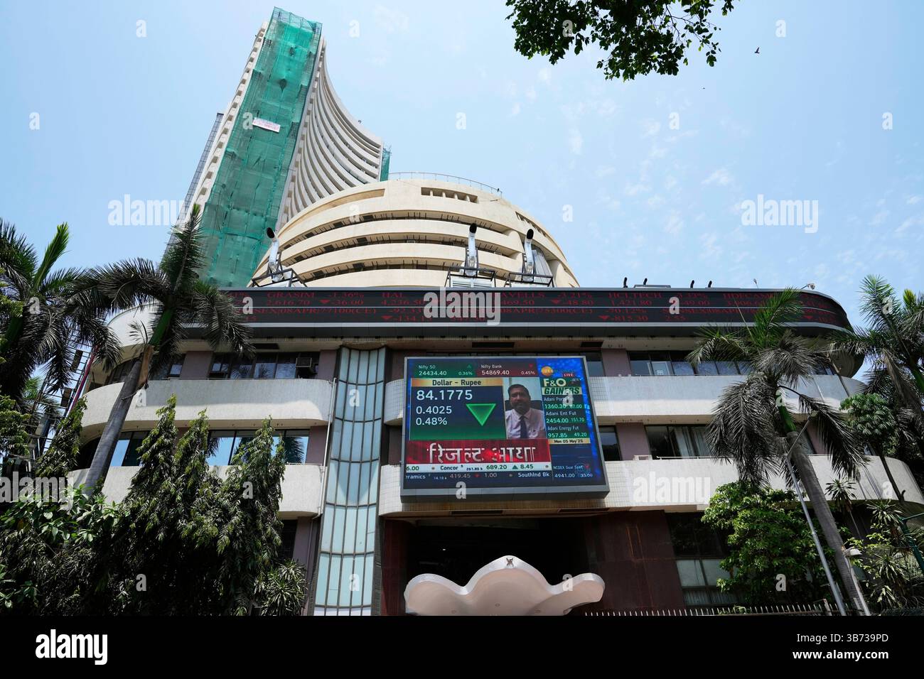 A live screen on the facade of the Bombay Stock Exchange (BSE) building ...