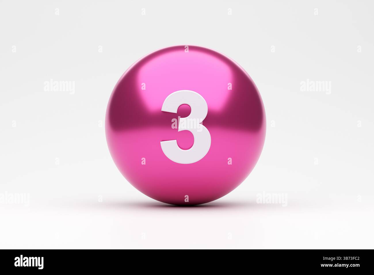 Number three on a pink sphere over a white background, ideal for educational, mathematical, or anniversary concepts Stock Photo