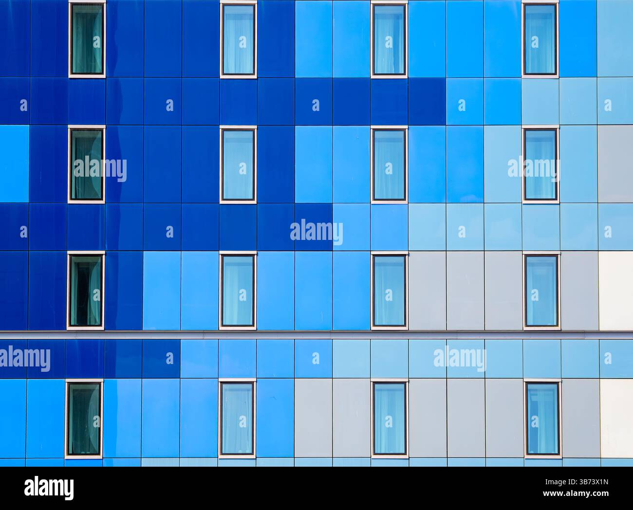 Modern blue glass building facade with reflective windows Stock Photo ...