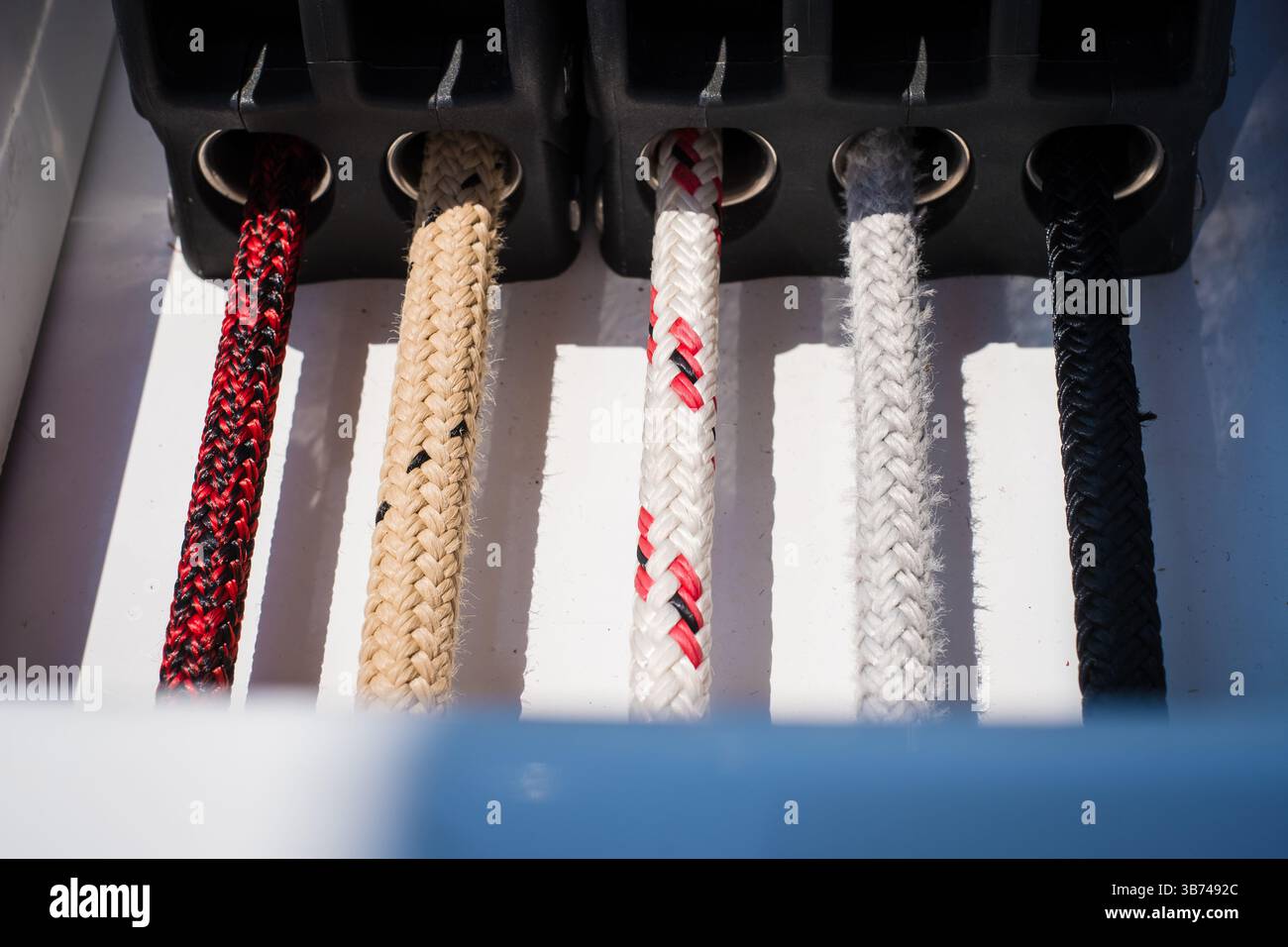 Sailing yacht ropes, stopper and winch. Sailboat equipment details ...