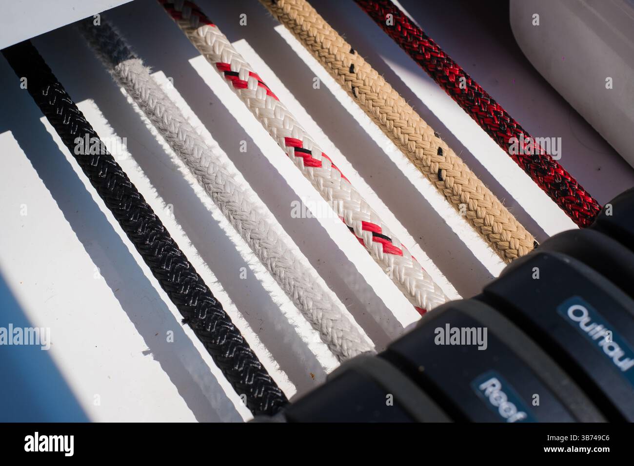 Sailing yacht ropes, stopper and winch. Sailboat equipment details ...