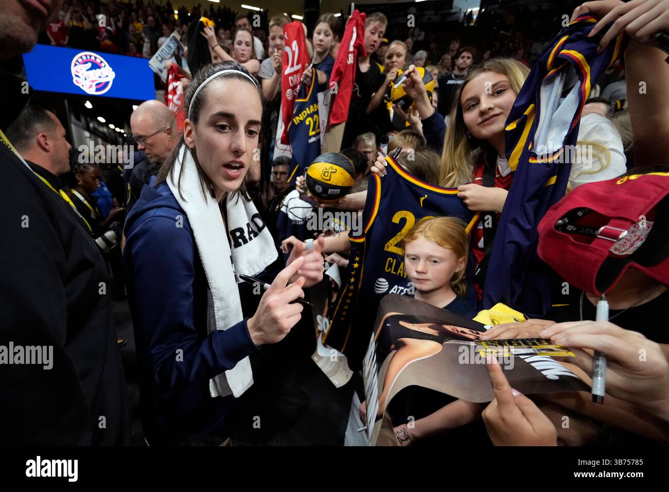 Indiana Fever guard Caitlin Clark signs autographs after an exhibition ...