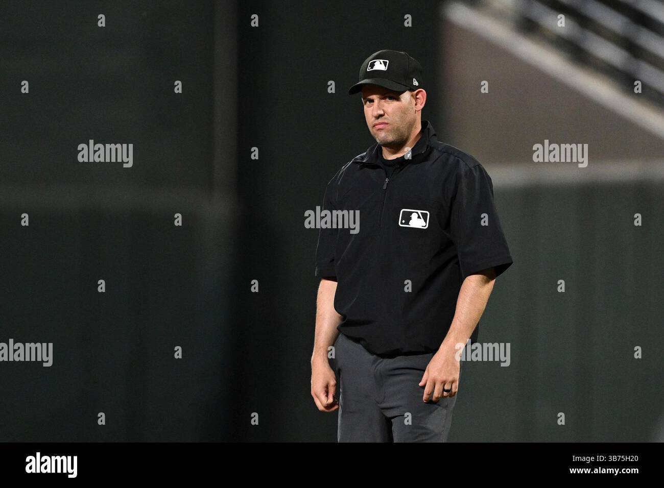 Umpire Dan Merzel looks on during a baseball game between the Baltimore ...