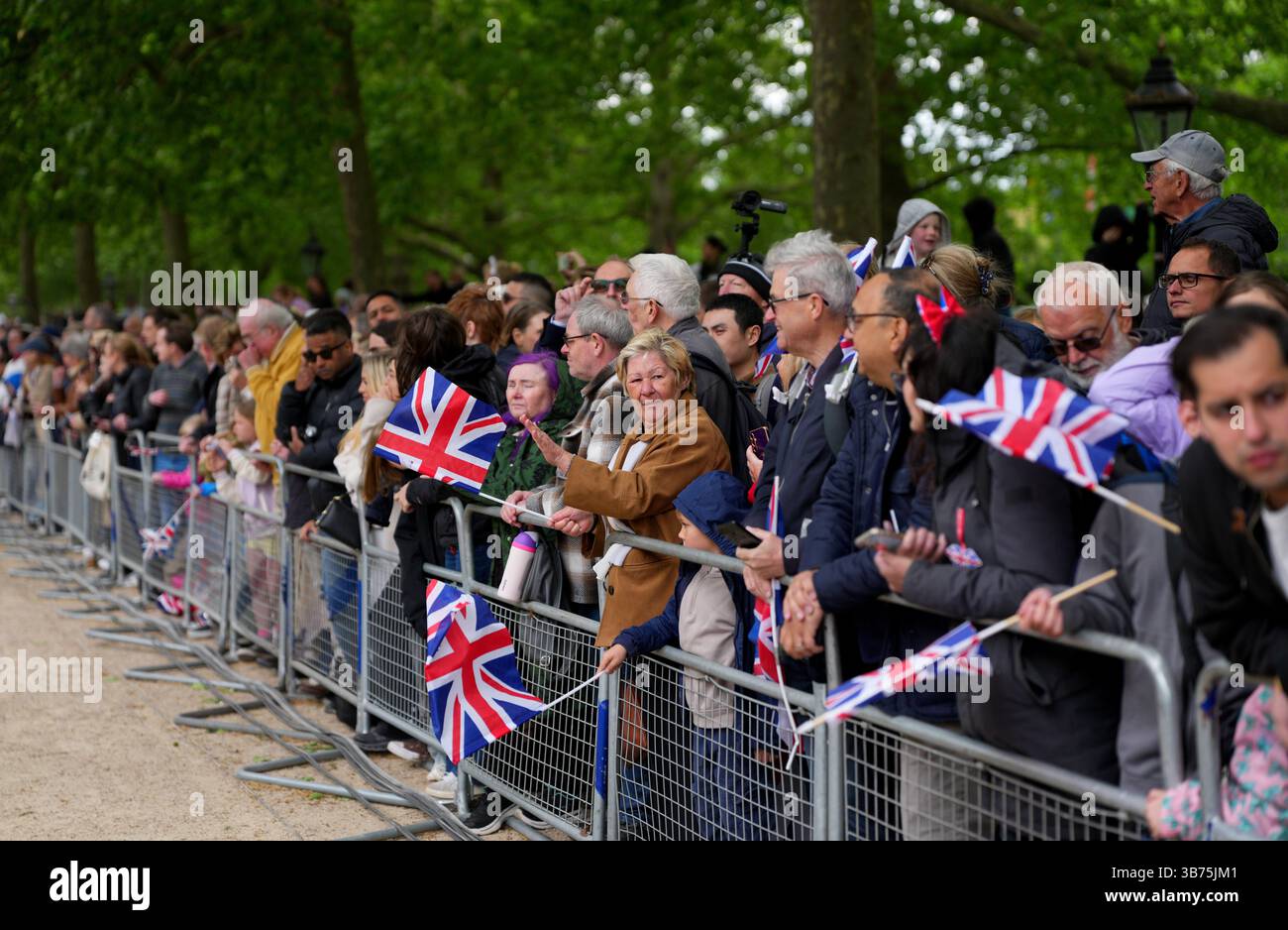 War Procession People watch the armed forces during a military procession marking the ...