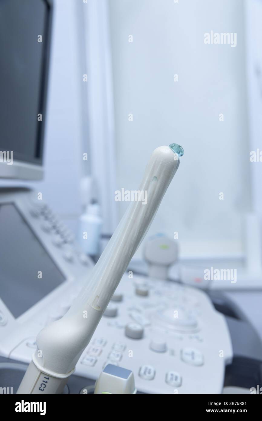 A close-up image showcasing an ultrasonography probe atop a sophisticated ultrasound machine, reflecting the technological advancements in medical dia Stock Photo
