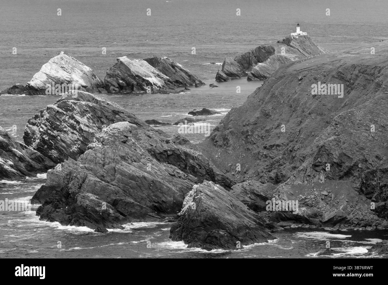 Dramatic cliffs dropping down to the Atlantic ocean on the Isle of Unst ...