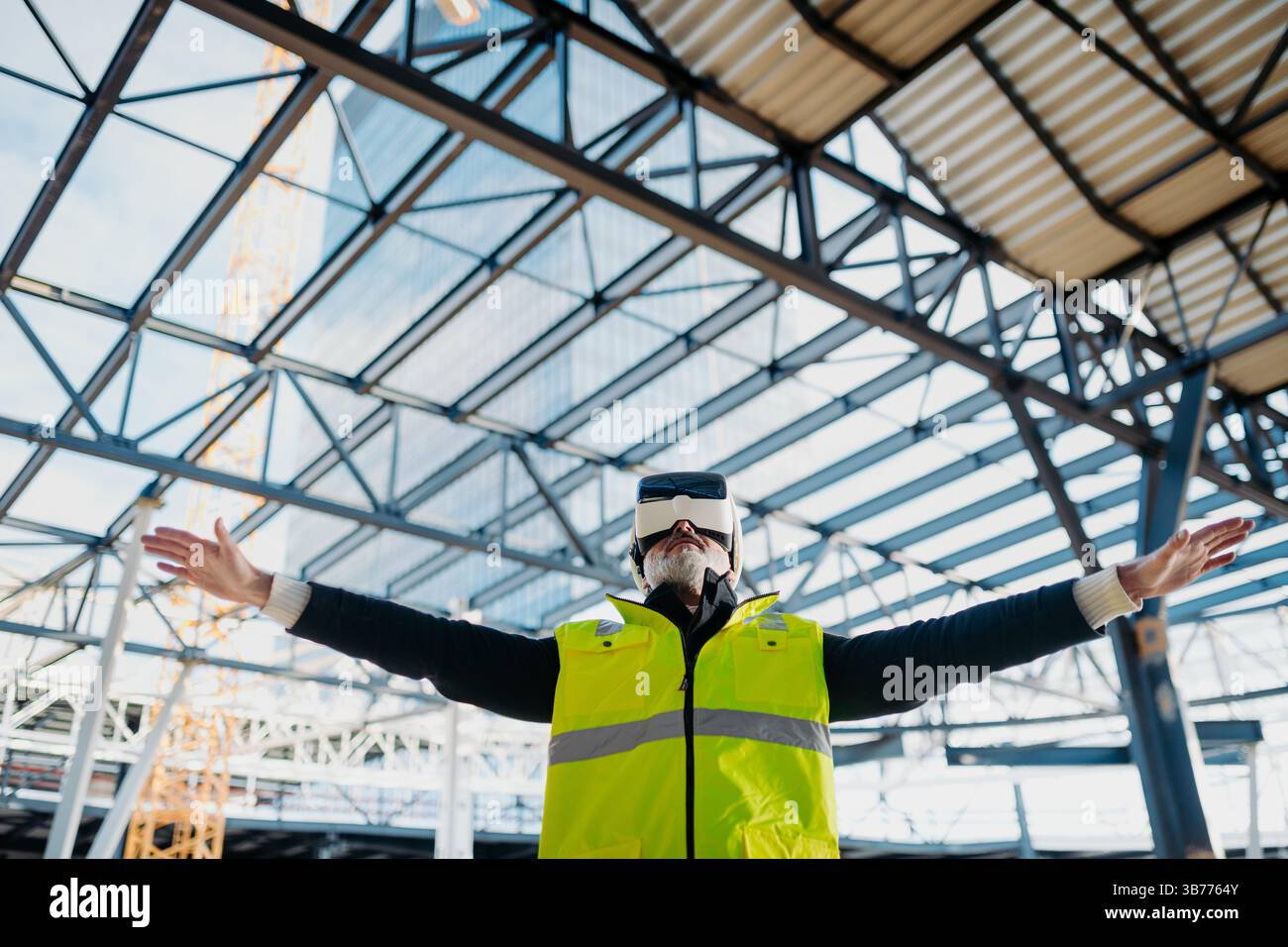 Engineer using virtual reality to inspect building progress. Stock Photo