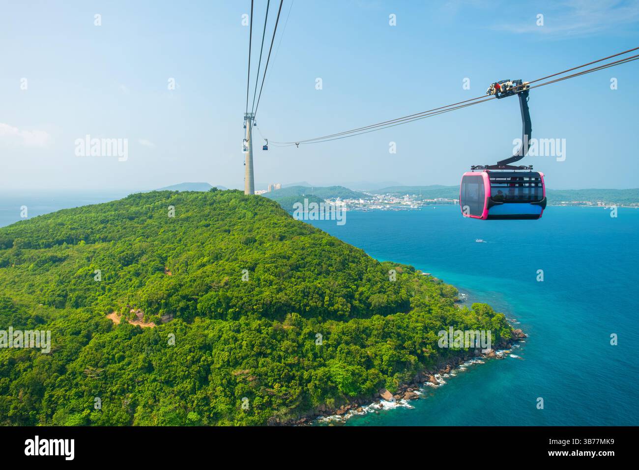 Aerial View Of Cable Car Gondola Gliding Over Lush Green Island Hills aerial-view-of-cable-car-gondola-gliding-over-lush-green-island-hills
