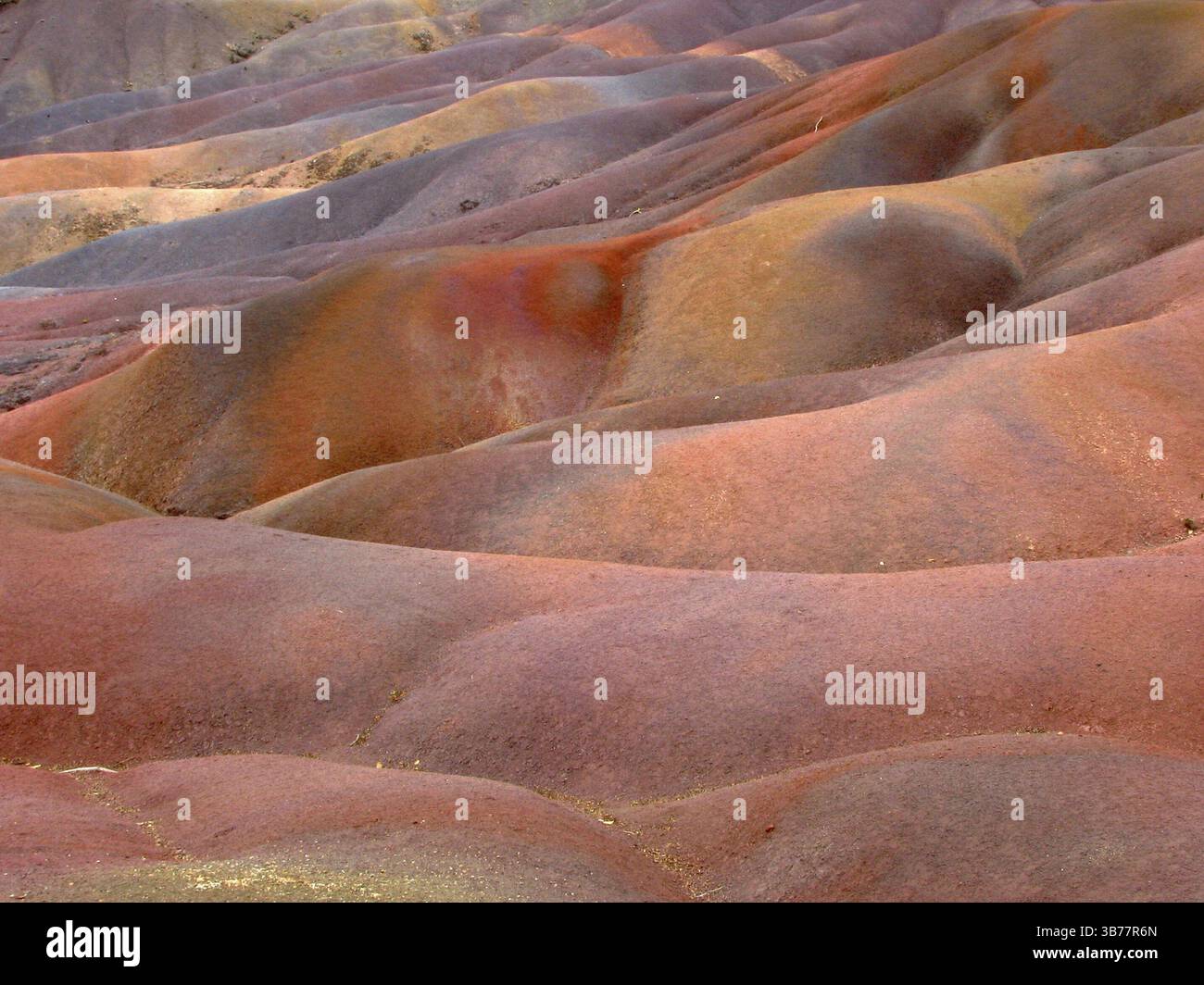 Old Volvanic Rocks Earth that shines strangely in different colours, it is of volcanic ...