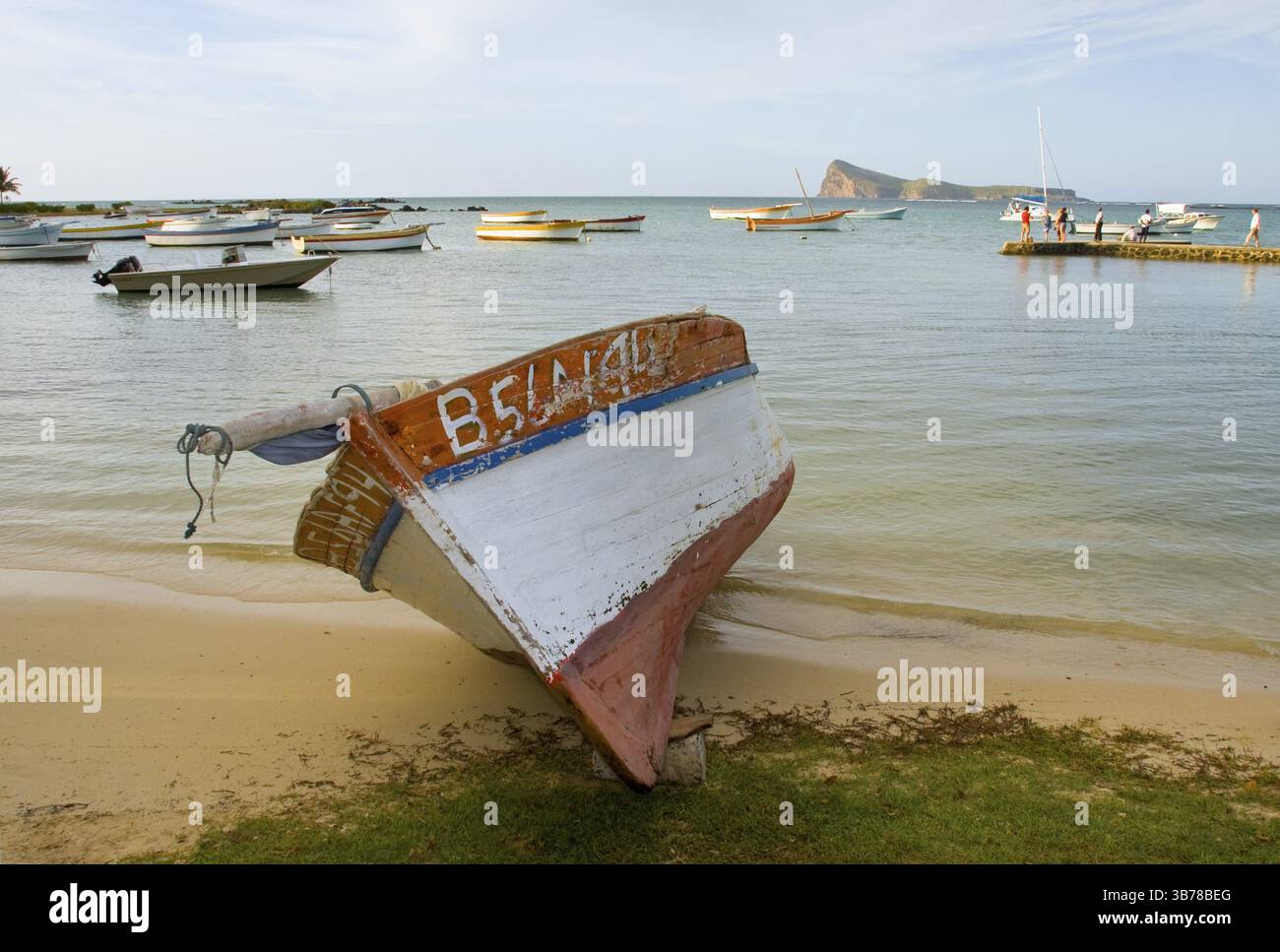 Fishing boat on the beach - Mauritius Stock Photo - Alamy