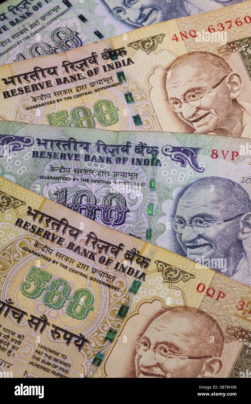 Different banknotes from India on the desk Stock Photo - Alamy