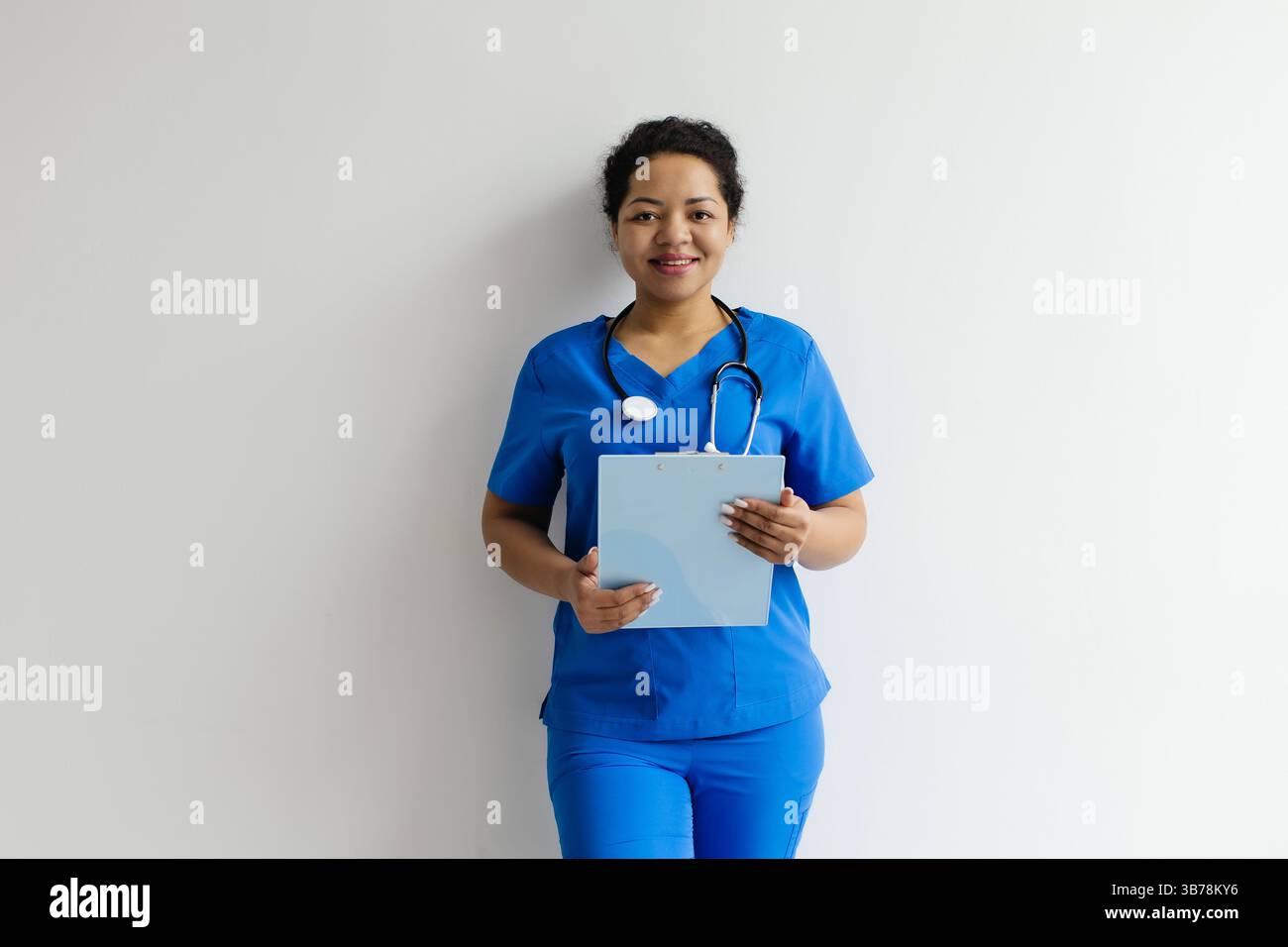 Female in blue uniform hi-res stock photography and images - Alamy