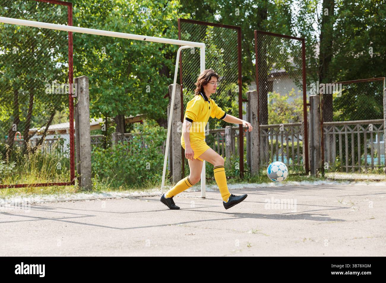 Teen scoring goal soccer hi-res stock photography and images - Alamy