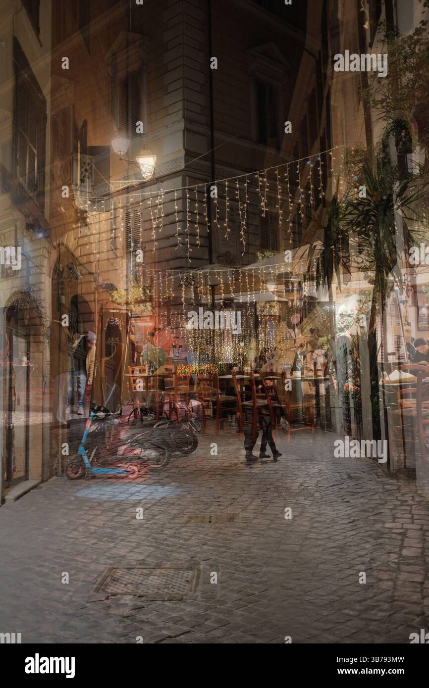 Narrow Roman streets decorated with Christmas lights at night people walking and festive atmosphere in old town Italy. High quality photo Stock Photo