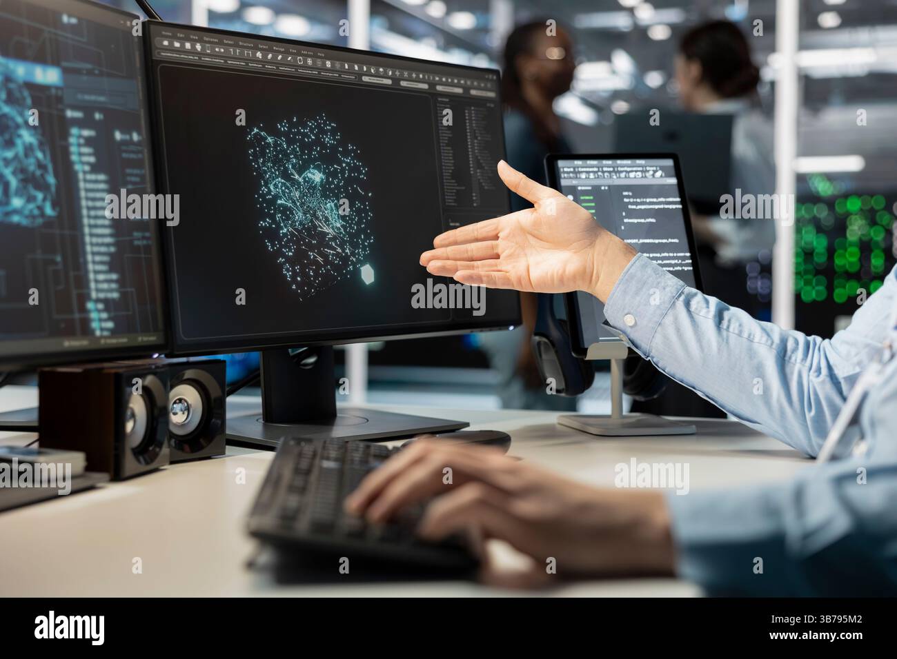 Close up of programmer looking at computer monitor in data center, managing server virtualization, running scripts. Worker using programming language on PC screen in server farm Stock Photo