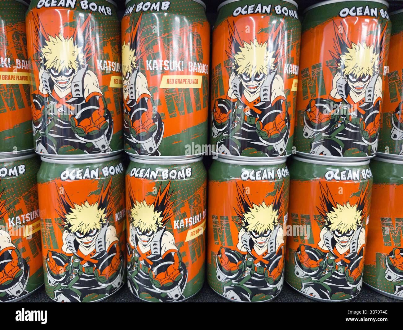 Ocean Bomb- Katsuki Bakugo Sparkling Water- Red Grape Flavour Beverage. Shelf display of side unit cans. - Smartphone Captured Stock Image