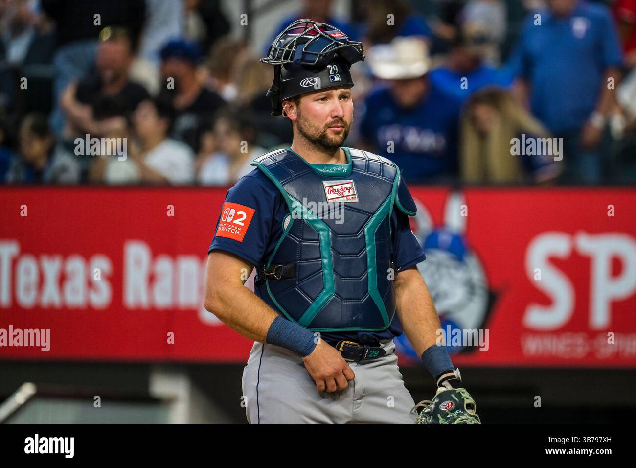 Seattle Mariners catcher Cal Raleigh walks towards home plate during ...