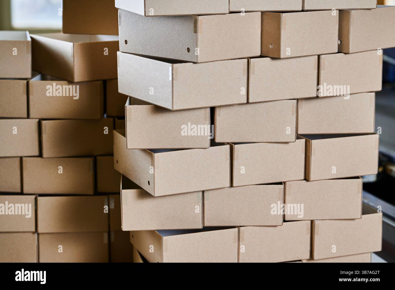 Stacked cardboard box blanks hi-res stock photography and images - Alamy