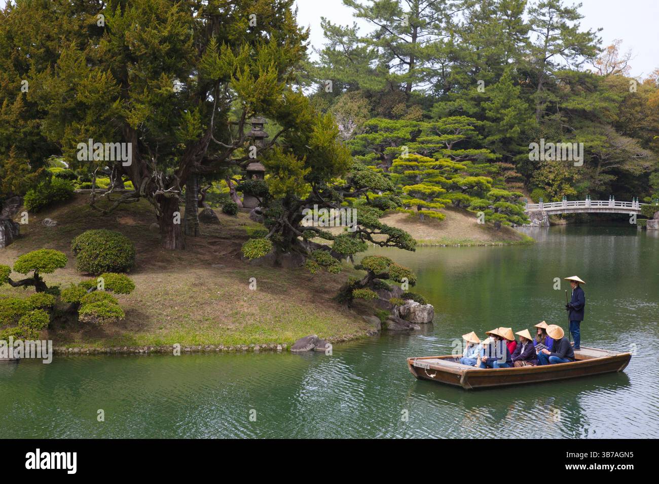 Japan, Shikoku, Takamatsu, Ritsurin-koen, garden, sightseeing boat, people, Stock Photo